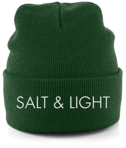 Close-up of a mustard Green cuffed beanie featuring high-quality white embroidery of the words 'SALT & LIGHT' in a modern, bold font