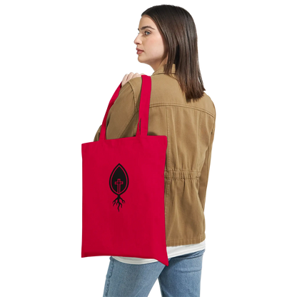 Red religious graphic tote bag with faith-based cross and root design